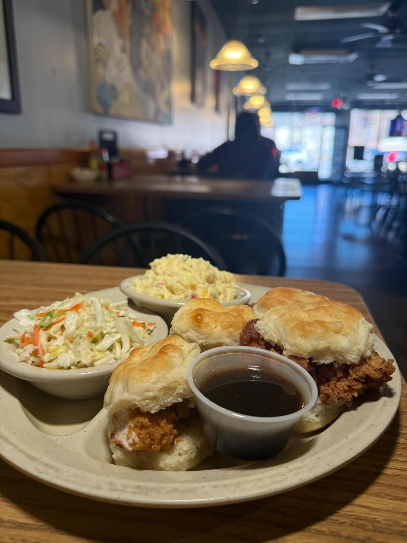 Fried chicken biscuits with coleslaw and potato salad